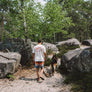 Red coyote print hemp T-shirt on male with dog