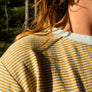 Yellow striped hemp long sleeve fabric close up