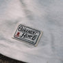 Hemp t-shirt with green coyote print woven label detail