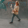 striped yellow hemp T-shirt on male with skateboard
