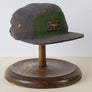 Hemp 5 panel cap in brown and green with woven label hemp plant