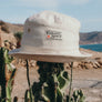 hemp bucket hat in off-white natural color with green string and metal ventilation holes