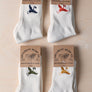 collection of embroidered hemp socks with crane bird embroidery