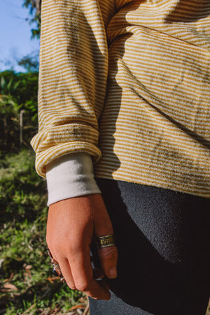 Yellow striped hemp long sleeve close up