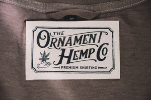 ash brown hemp T-shirt with screen-printed neck label close-up