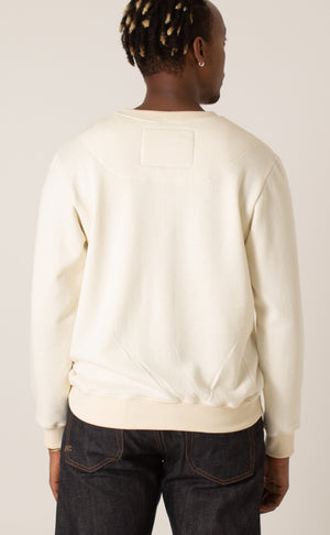 Crewneck sweater with indigo pocket