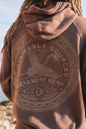 Sustainable hemp and bamboo hoodie in brown color with crane print on back detail