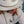 hemp bucket hat in off-white natural color with green string and metal ventilation holes on female