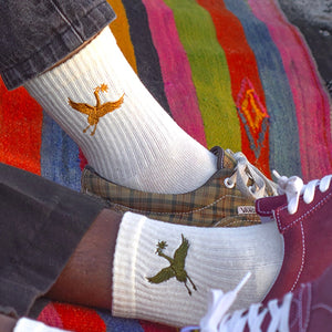 Embroidered hemp socks with crane bird embroidery on models
